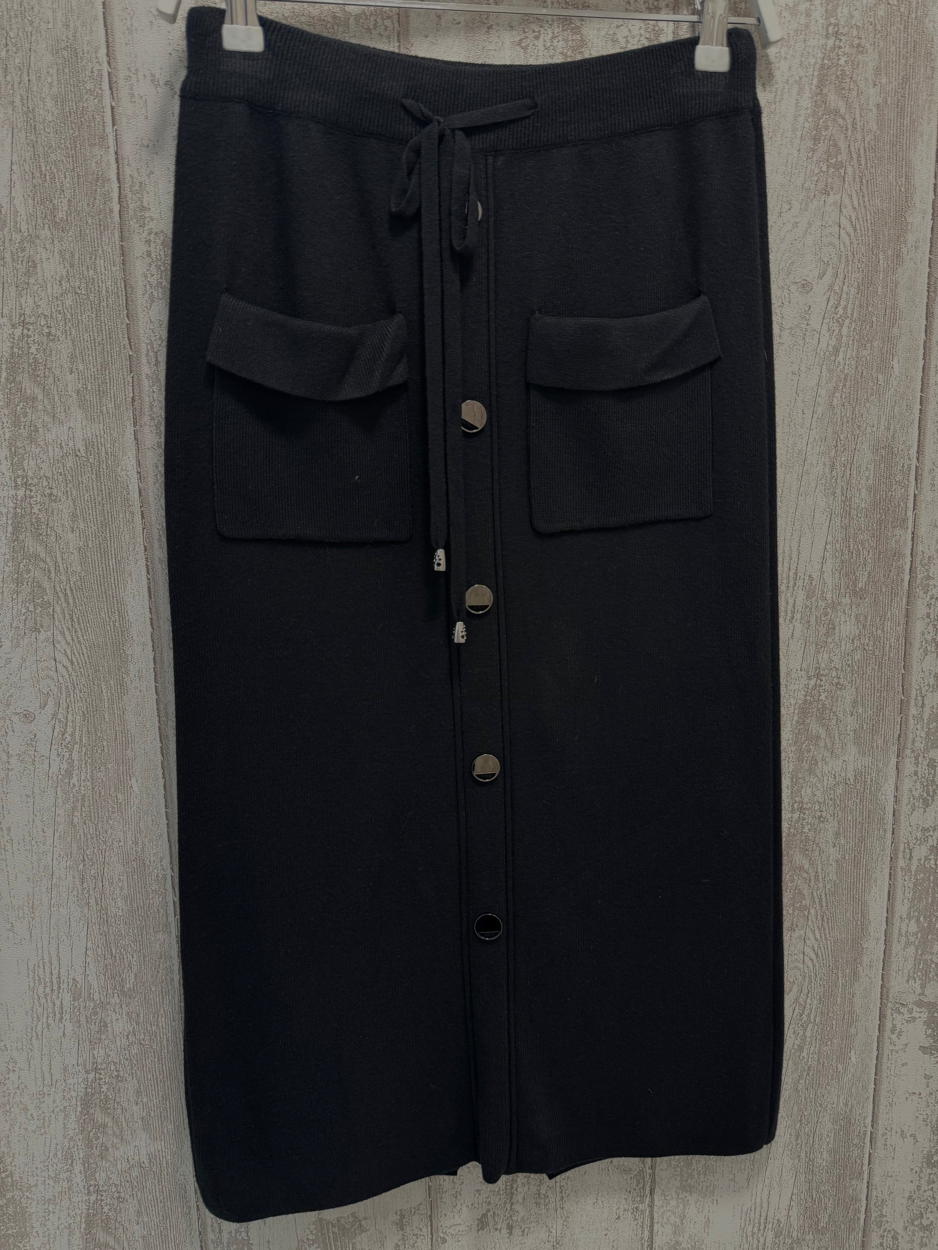 FALDA DE PUNTO BOLSILLOS