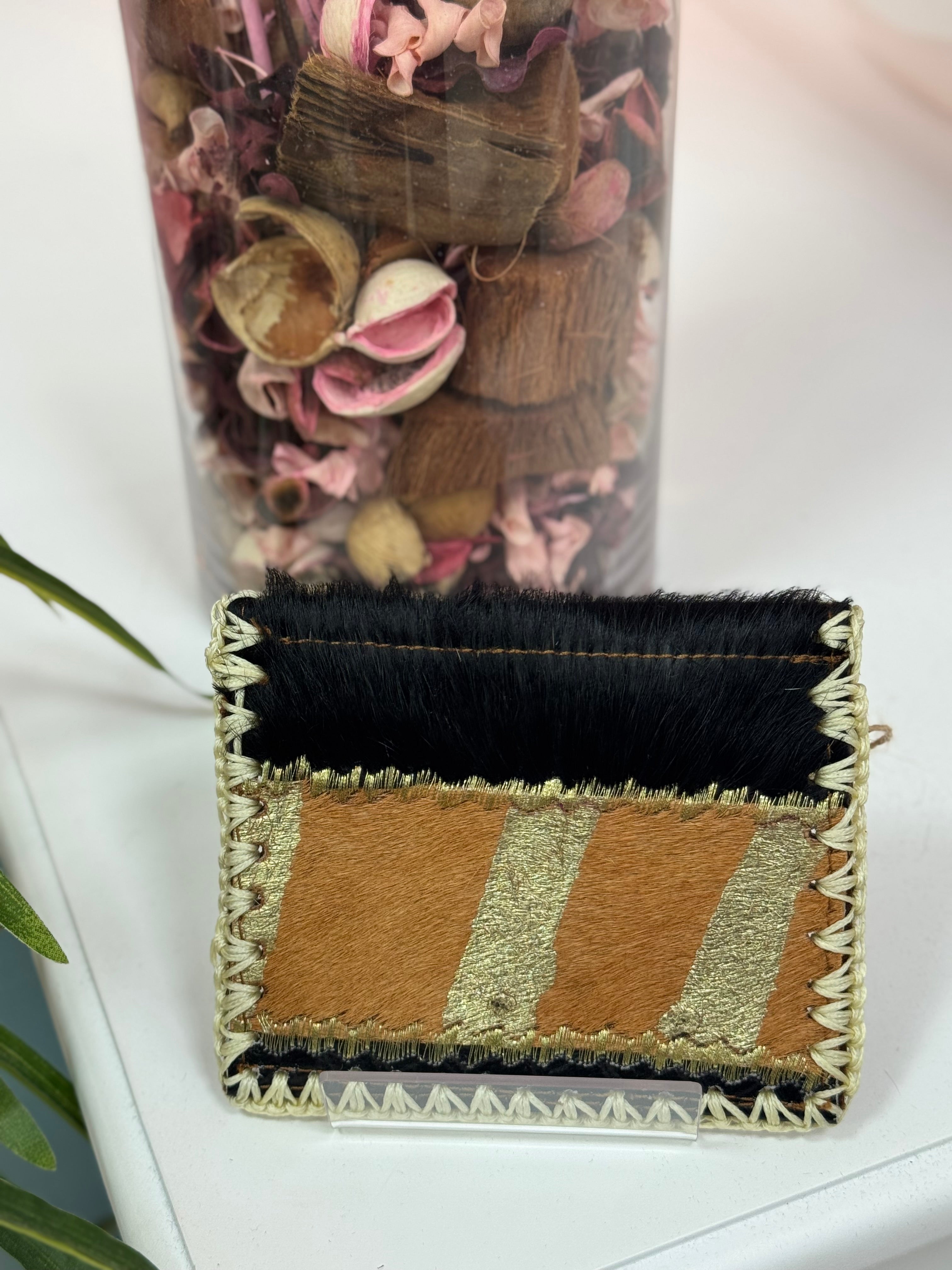 MONEDERO PIEL PELO CALDERA