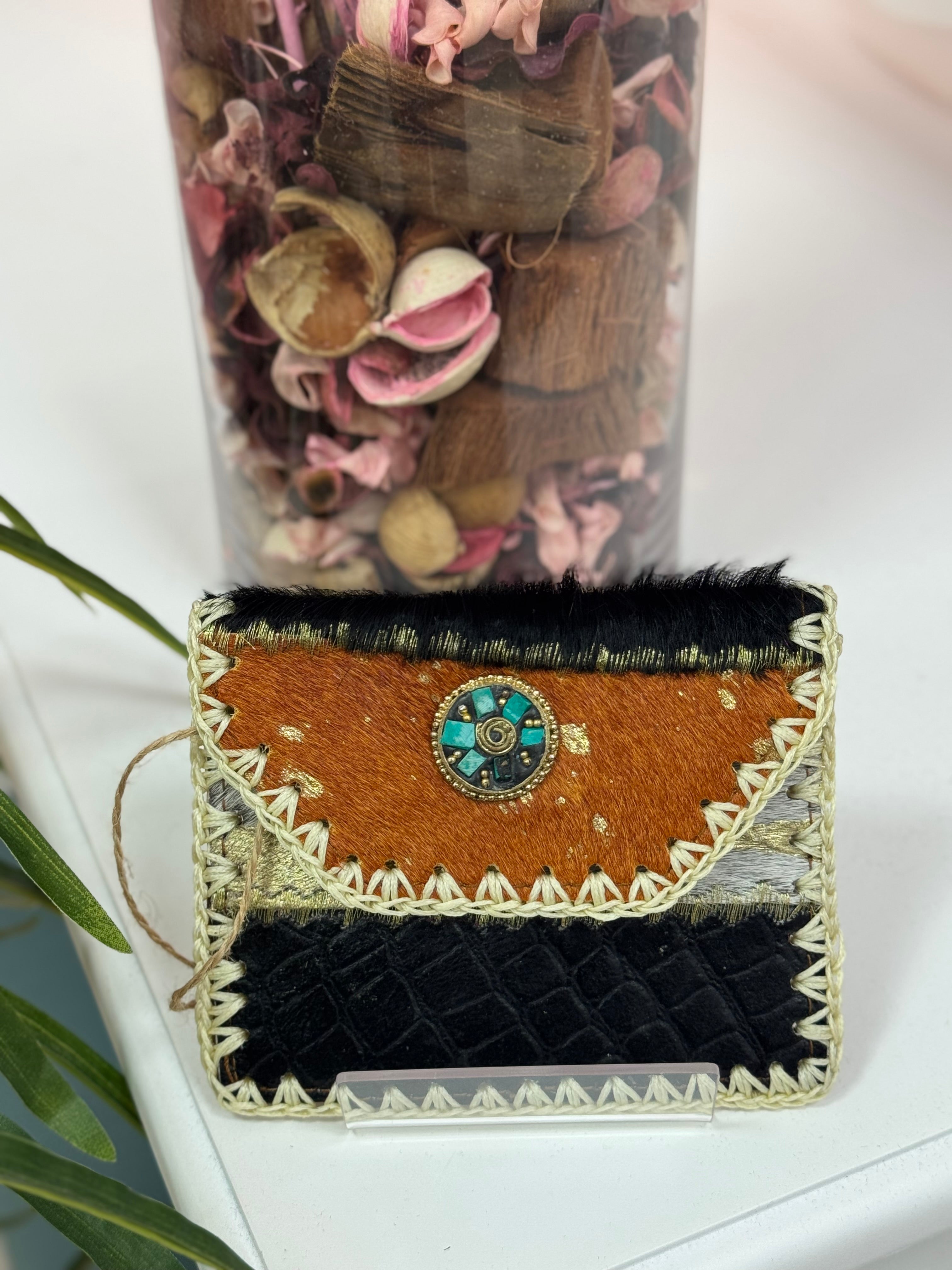 MONEDERO PIEL PELO CALDERA