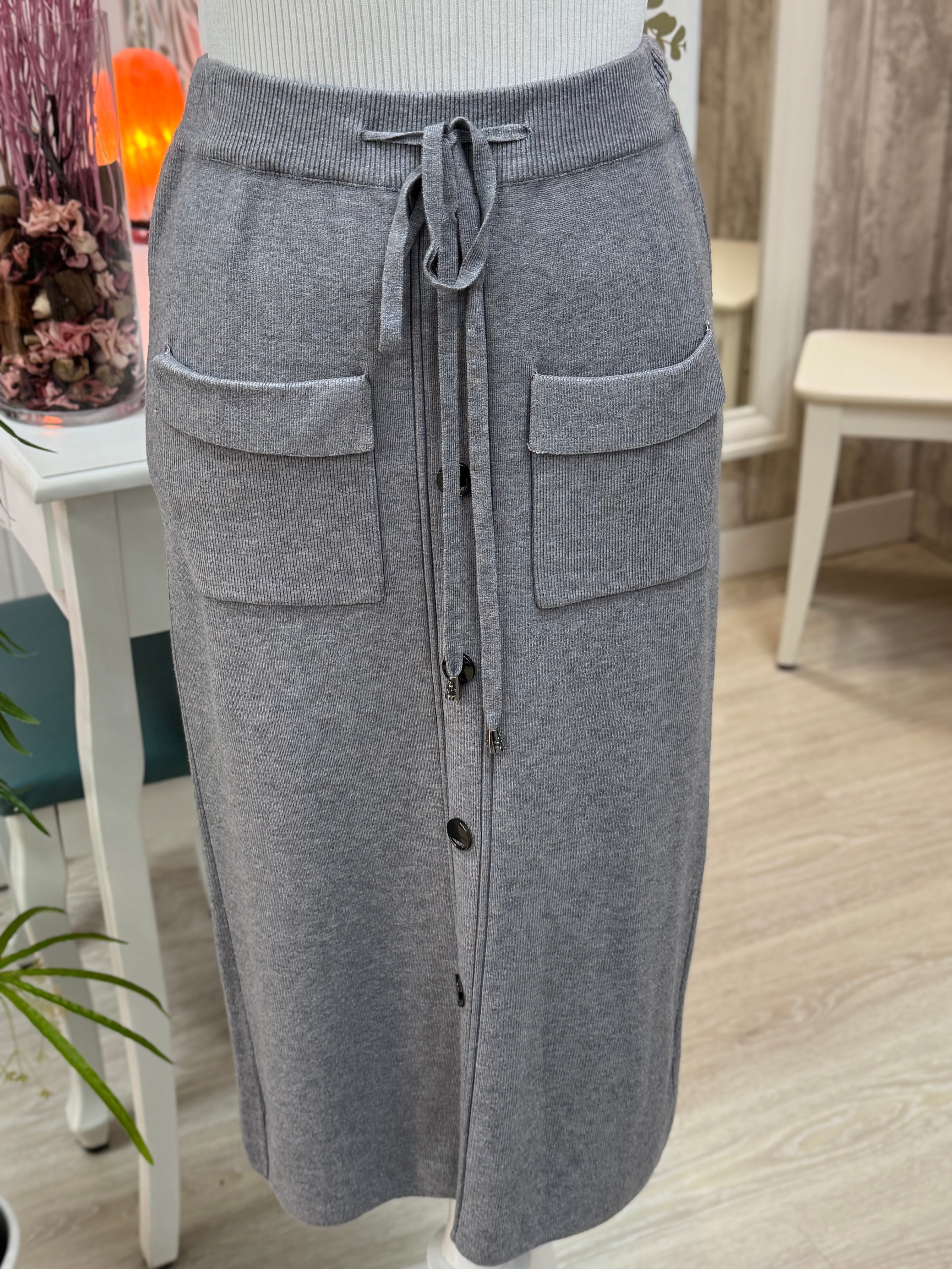 FALDA DE PUNTO BOLSILLOS