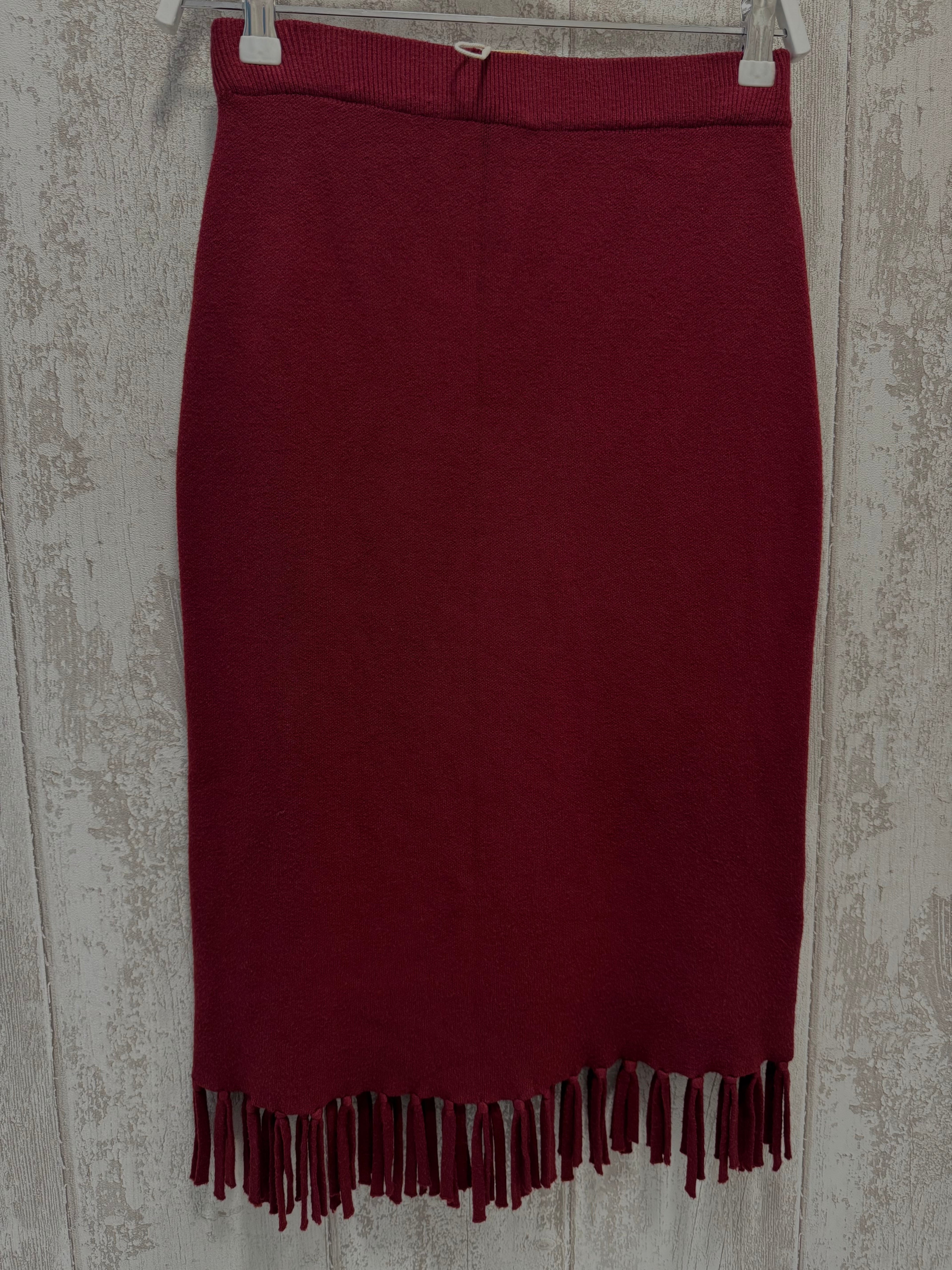 FALDA DE PUNTO CON FLECOS