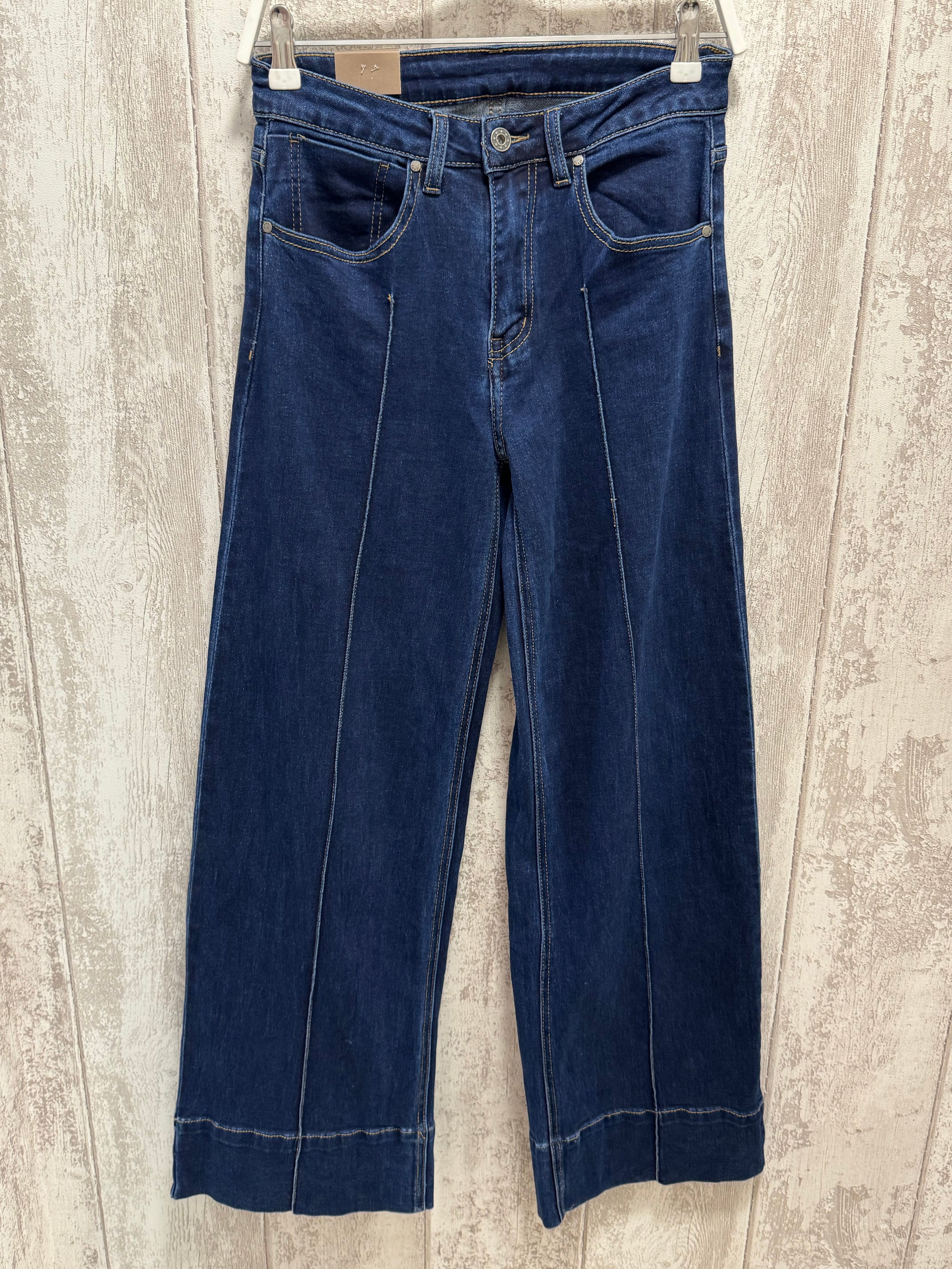 VAQUEROS DOBLADILLO Y COSTURA