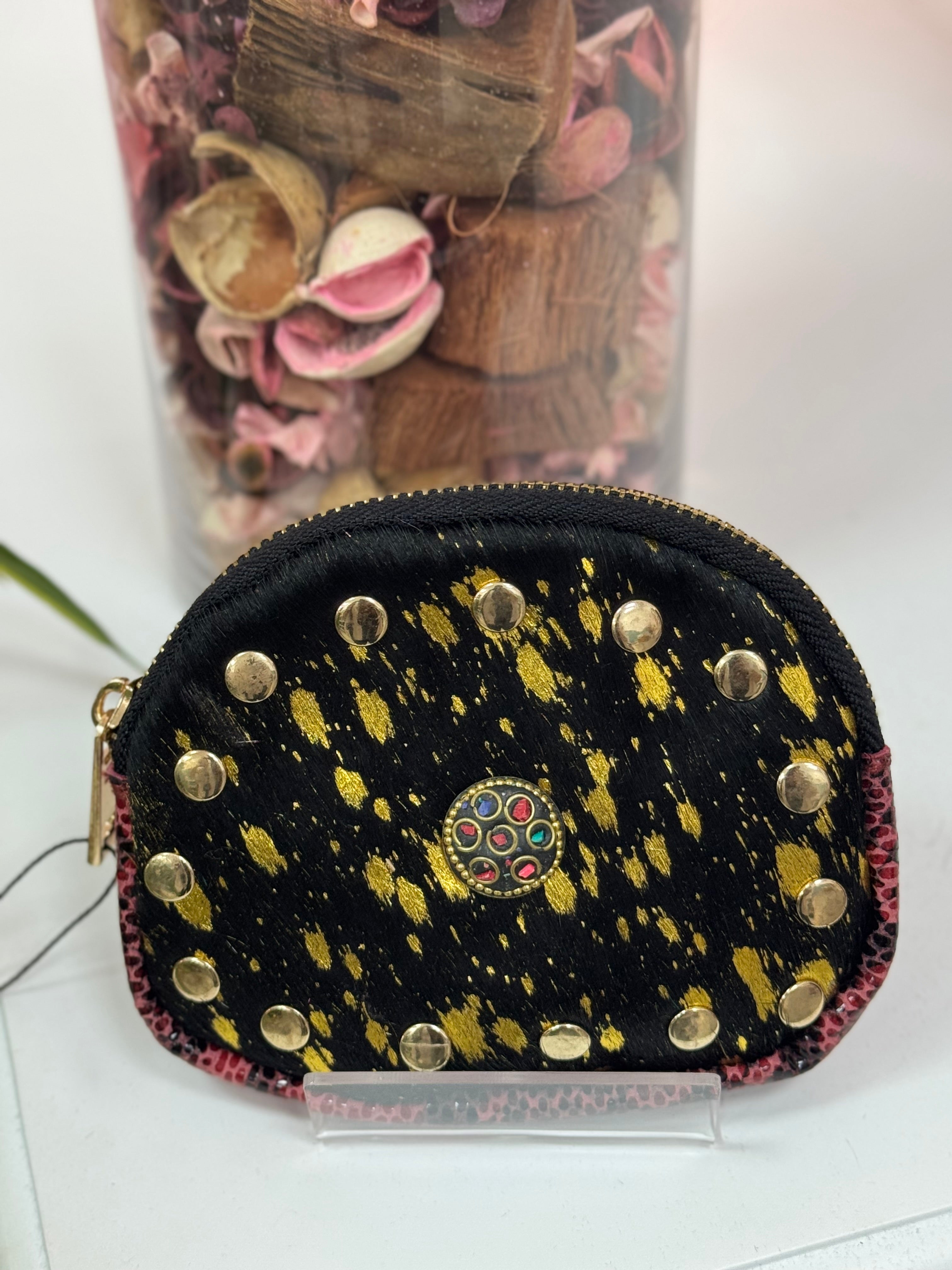 MONEDEROS PIEL OVALADO TACHAS