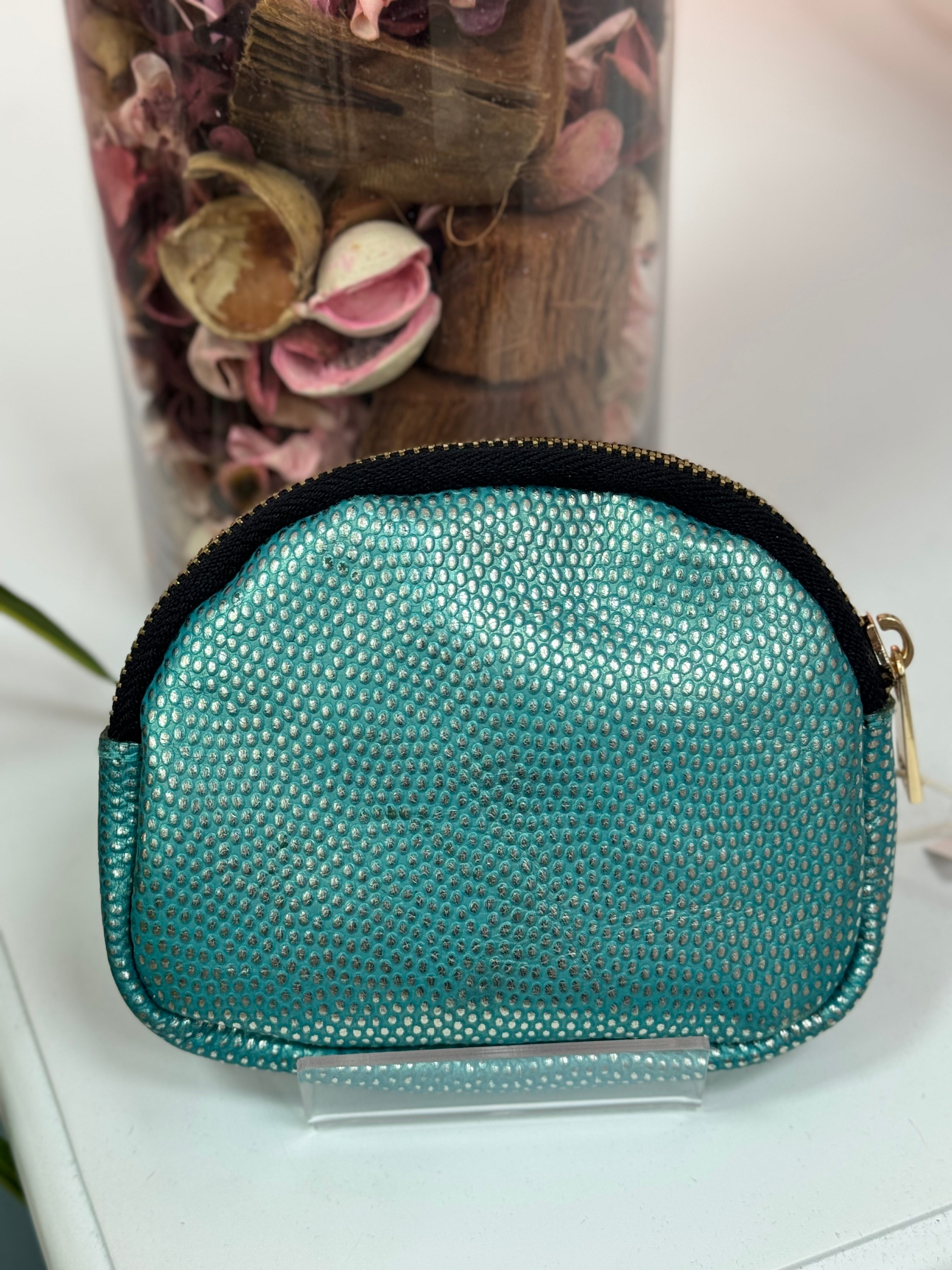 MONEDEROS PIEL OVALADO TACHAS