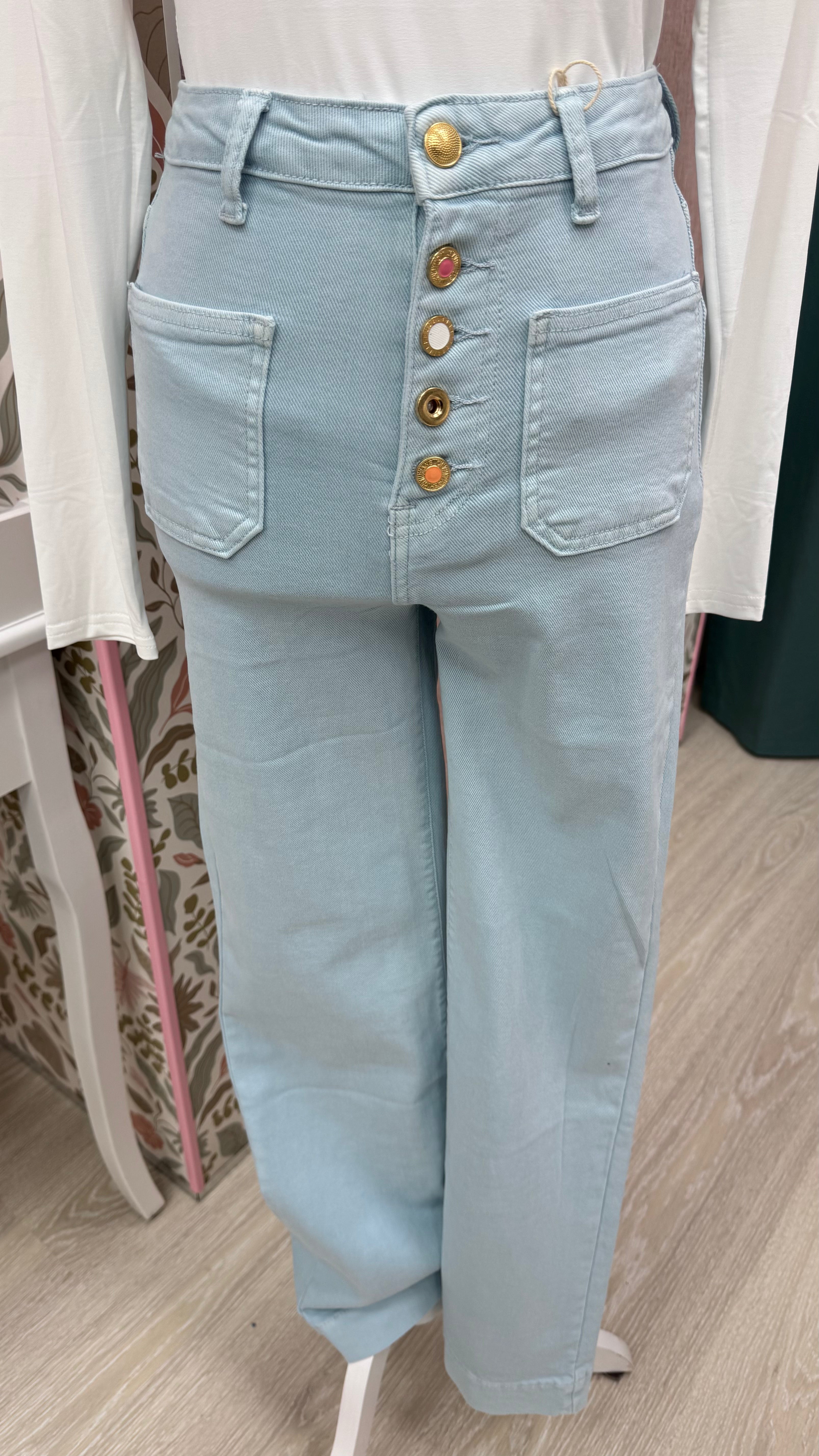VAQUEROS BOTONES CELESTE
